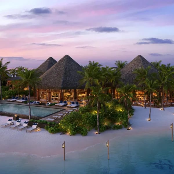 Architectural visualization of a beachfront resort with thatched pavilions and pool at sunset