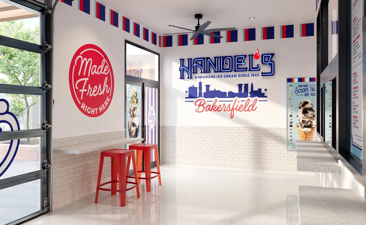 Ice cream store interior CGI — Handel's Bakersfield, California with city skyline wall decal, subway tile, and red stools