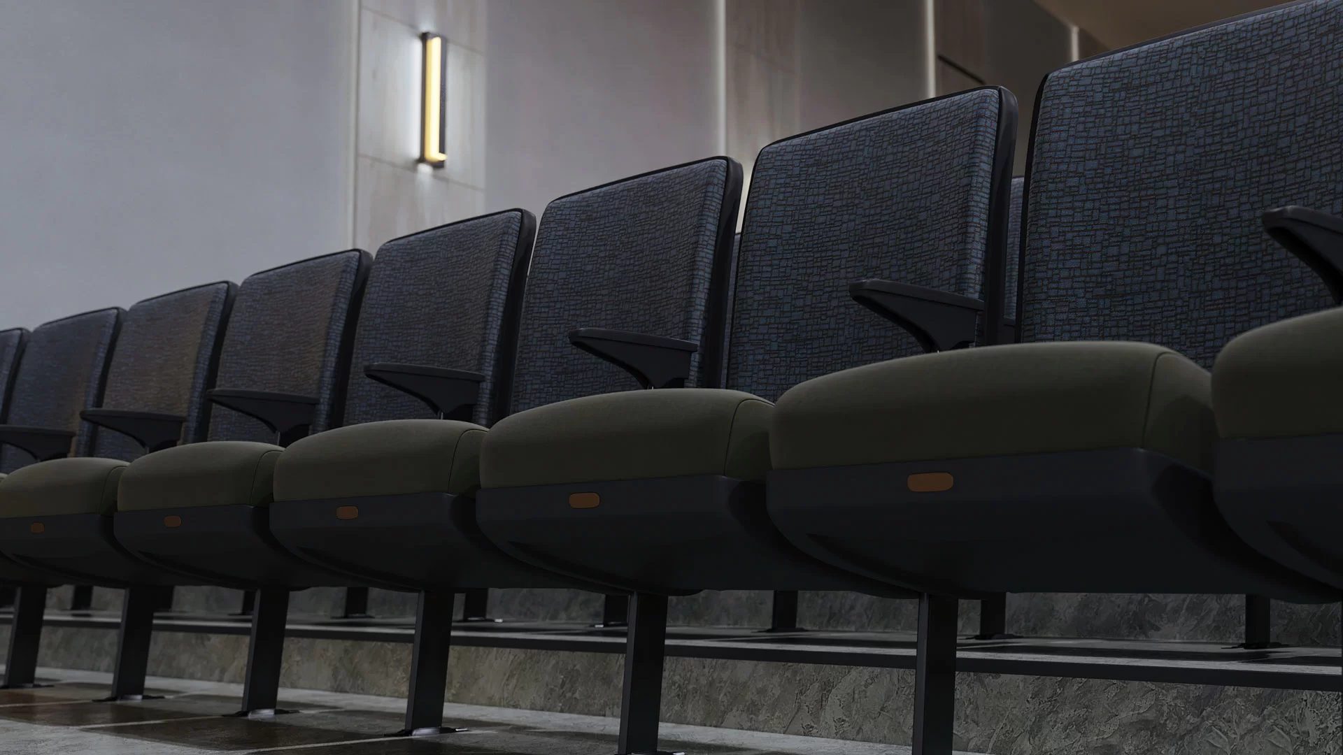 3D visualization of upholstered auditorium chairs with armrests and sleek fabric patterns