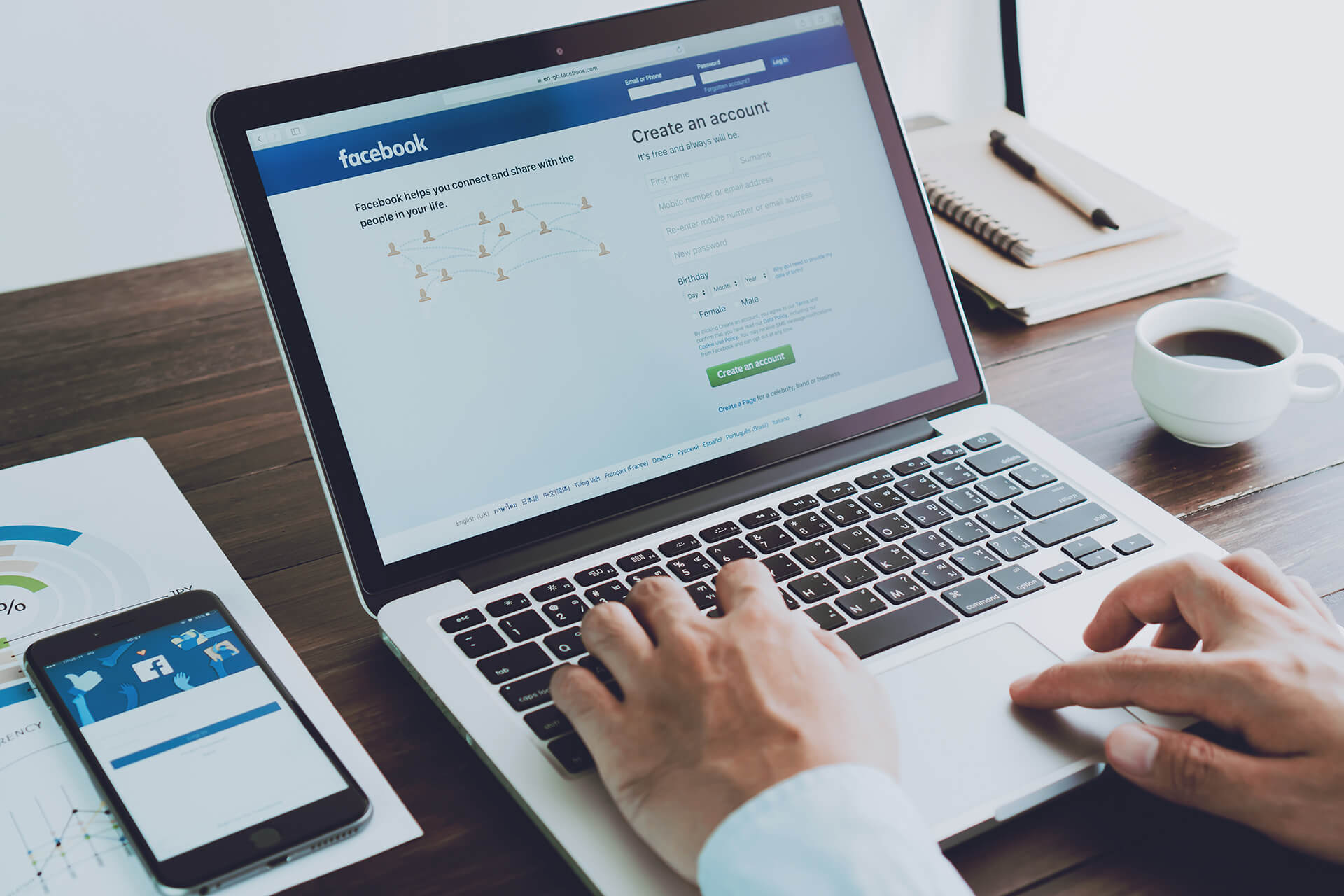 Businessman Looking at a Facebook page