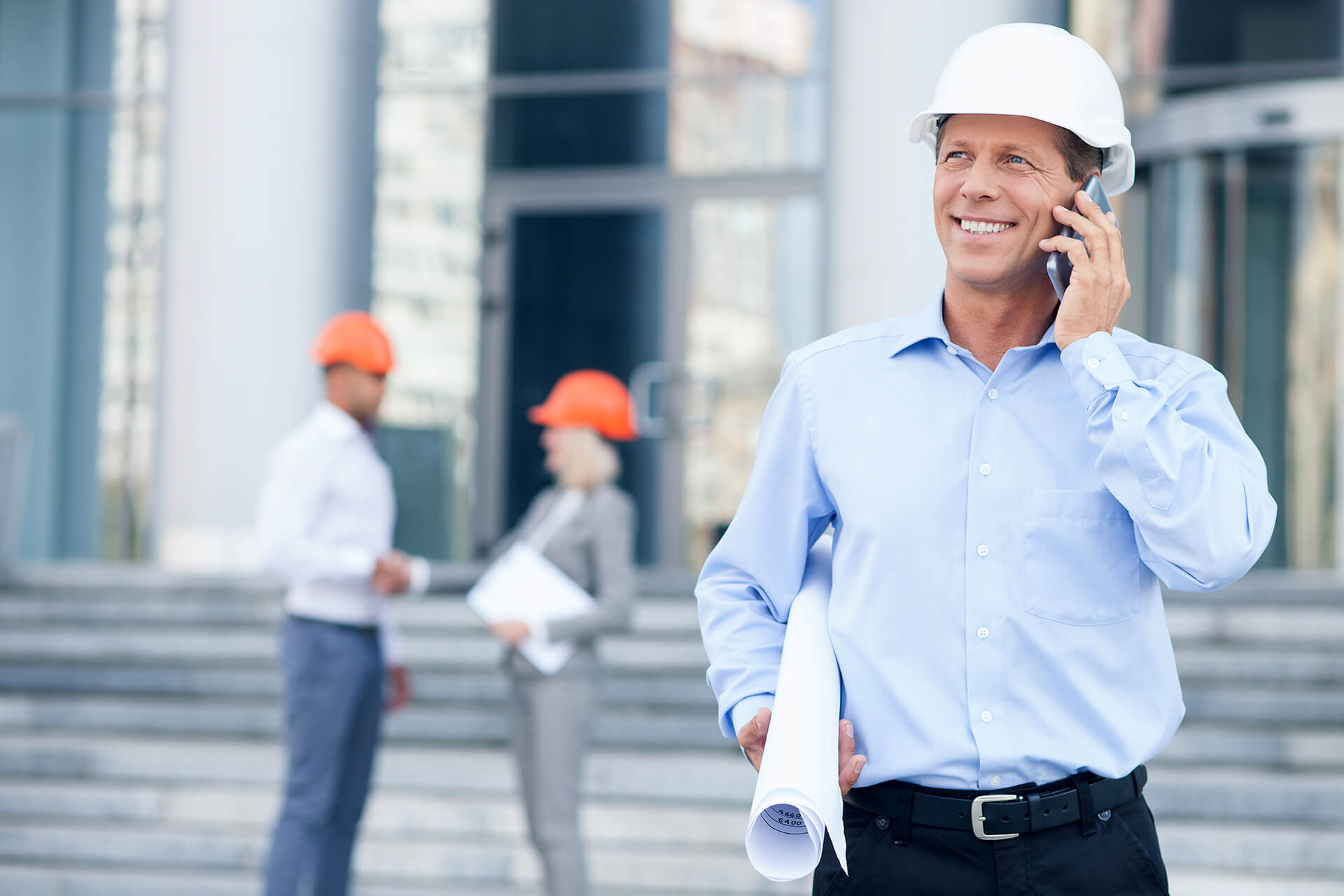 Architect Telling Good News to the Client on the Phone