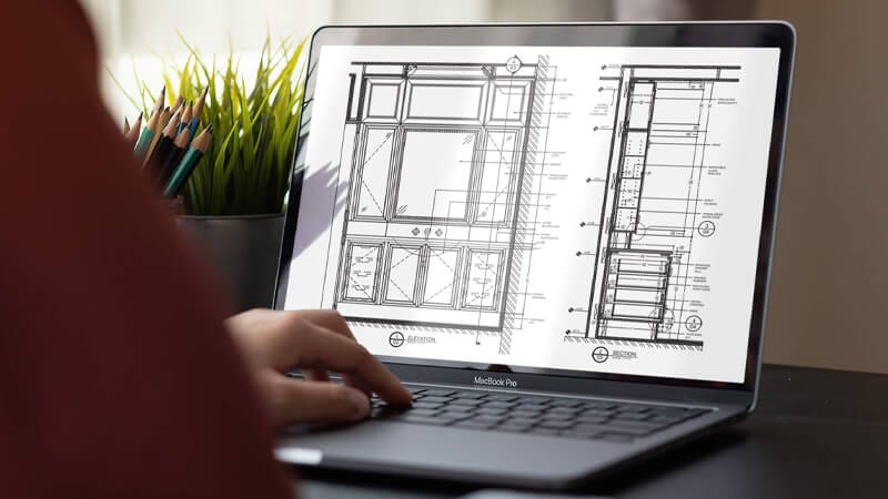 Architectural floor plan drawing displayed on a laptop