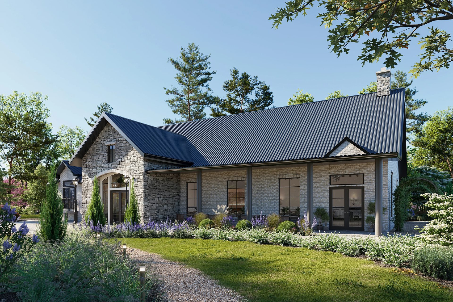 Light stone event venue with tall windows and a curved gravel path lined with lavender