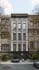 3D architectural visualization of a neoclassical townhouse facade with columns and refined symmetry in New York City