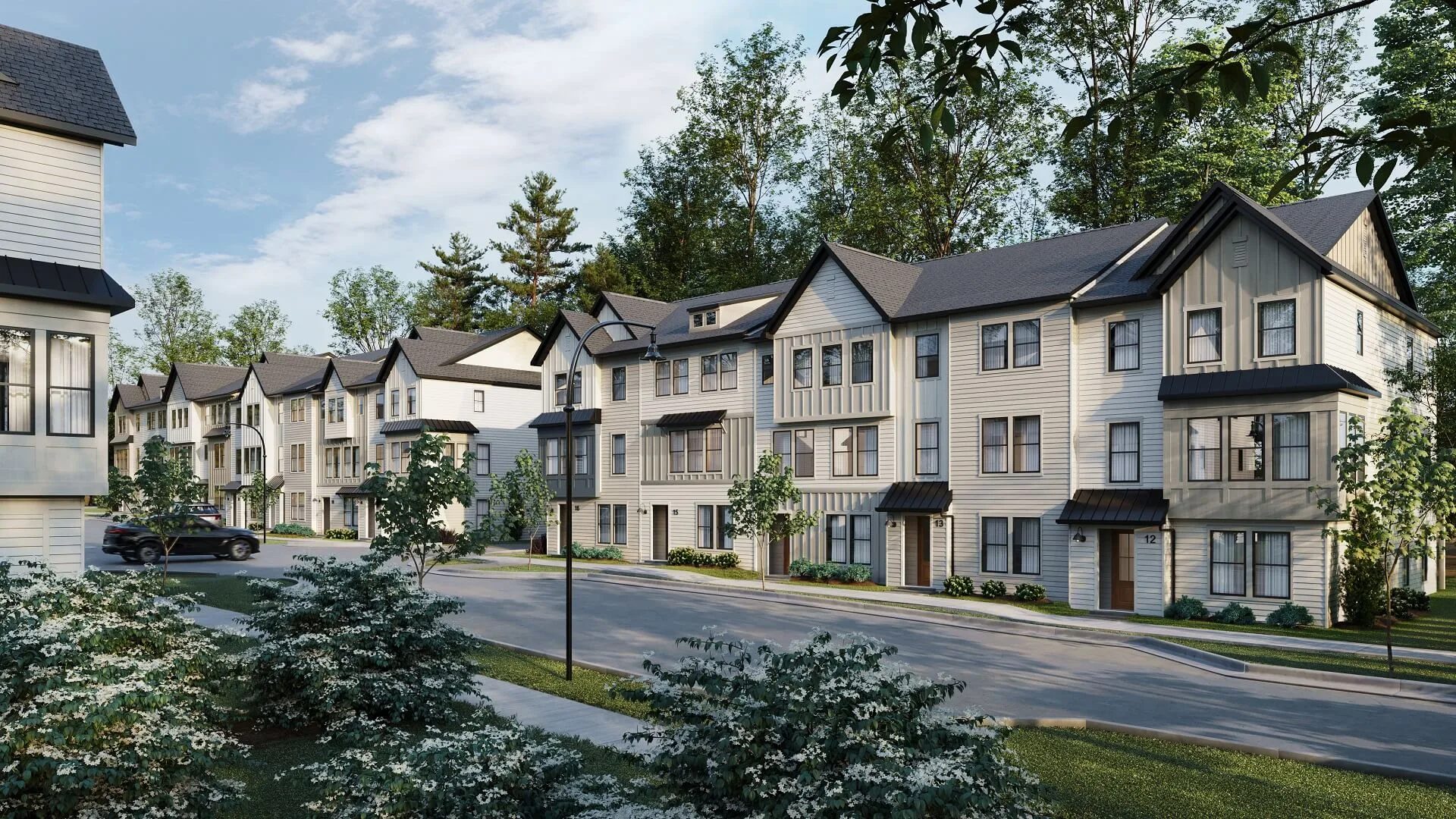 3D rendering of Chicago multifamily housing with landscaped streets, pitched roofs, and townhouse-style facades