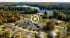 3D animation of a lakeside cottage resort park near Parry Sound, Ontario, with park-model trailers, drone footage integration, and surrounding wilderness