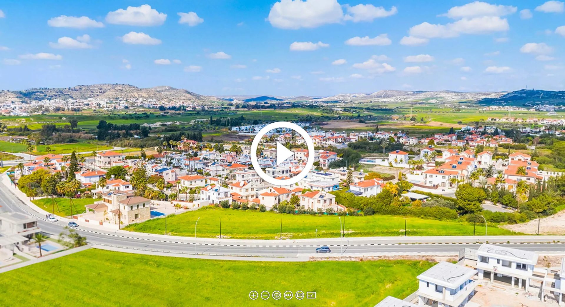 3D virtual tour for a residential community: aerial view of hillside houses above the sea
