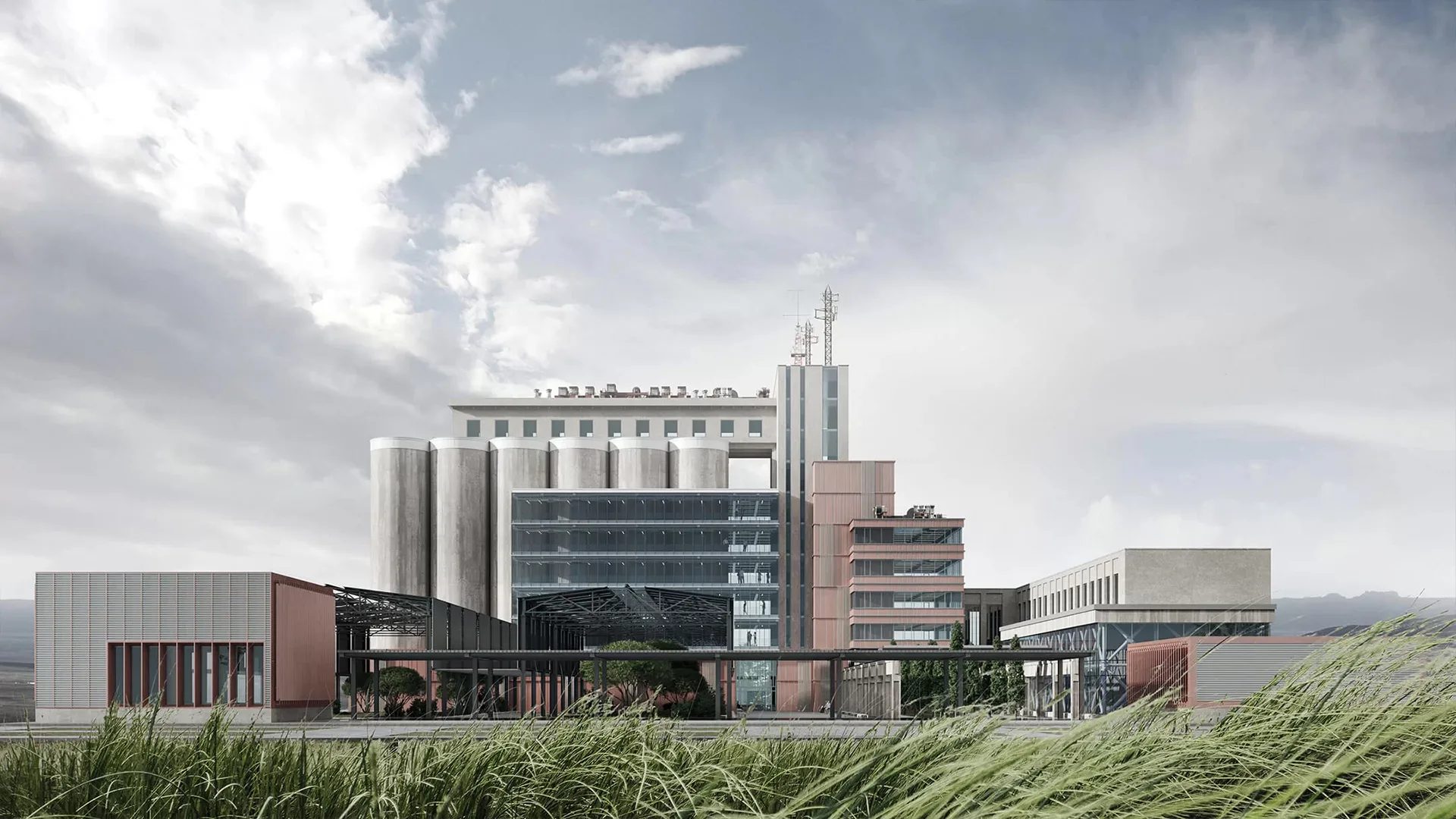 Exterior 3D rendering of an industrial facility with silos and processing buildings