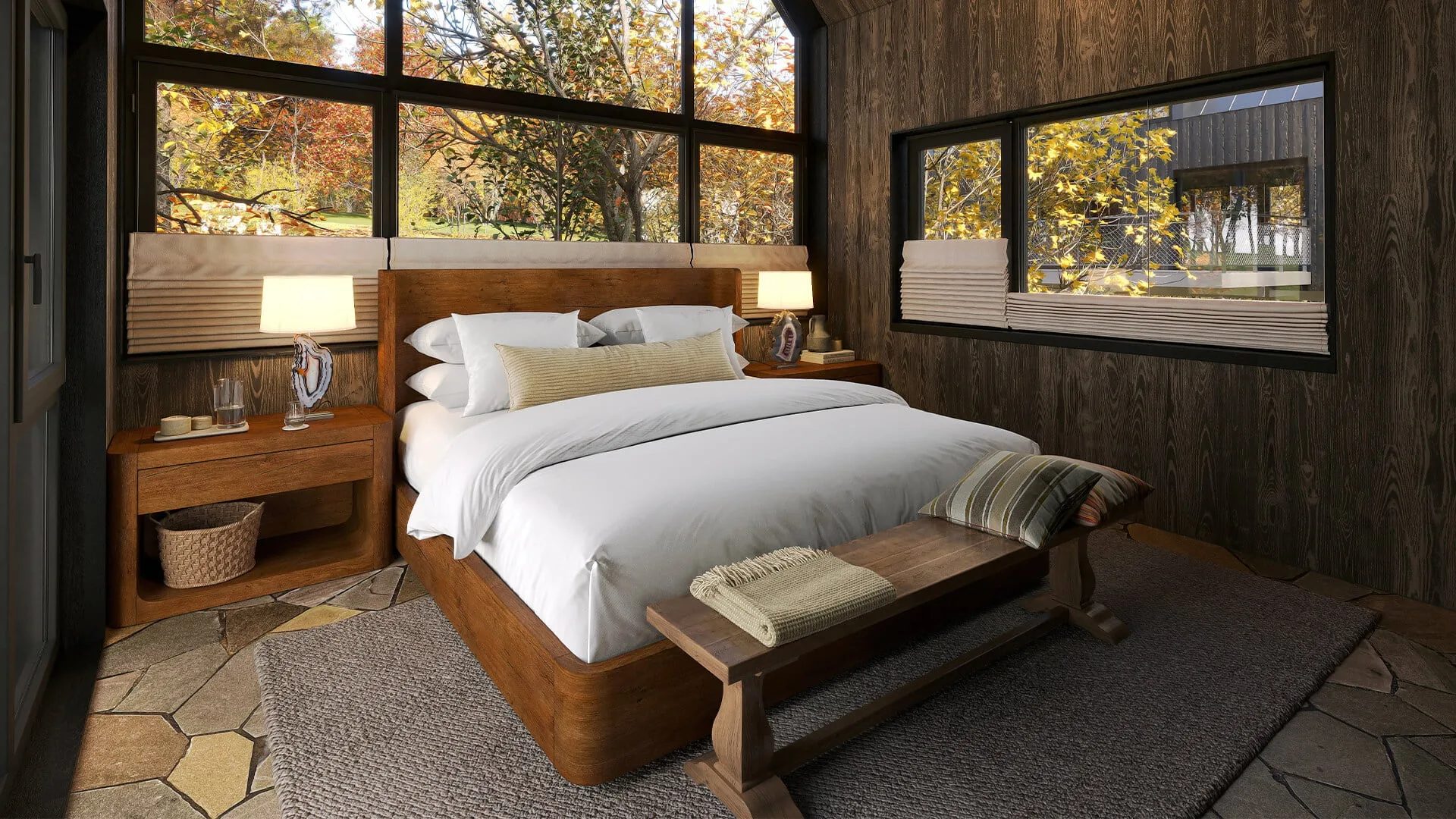 Hotel room rendering of a cabin suite with dark timber walls and a forest view