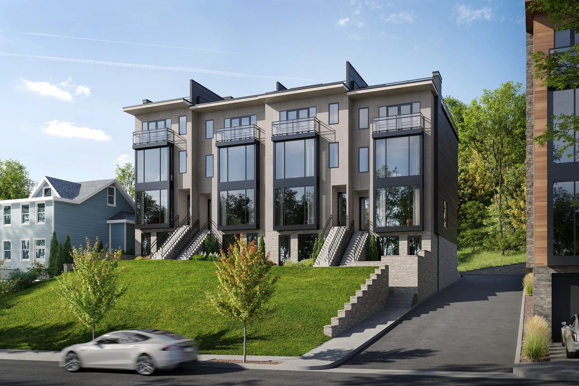 3D rendering of a row of three-story modern townhouses with glass balconies and stone retaining walls on a hillside street in Pittsburgh