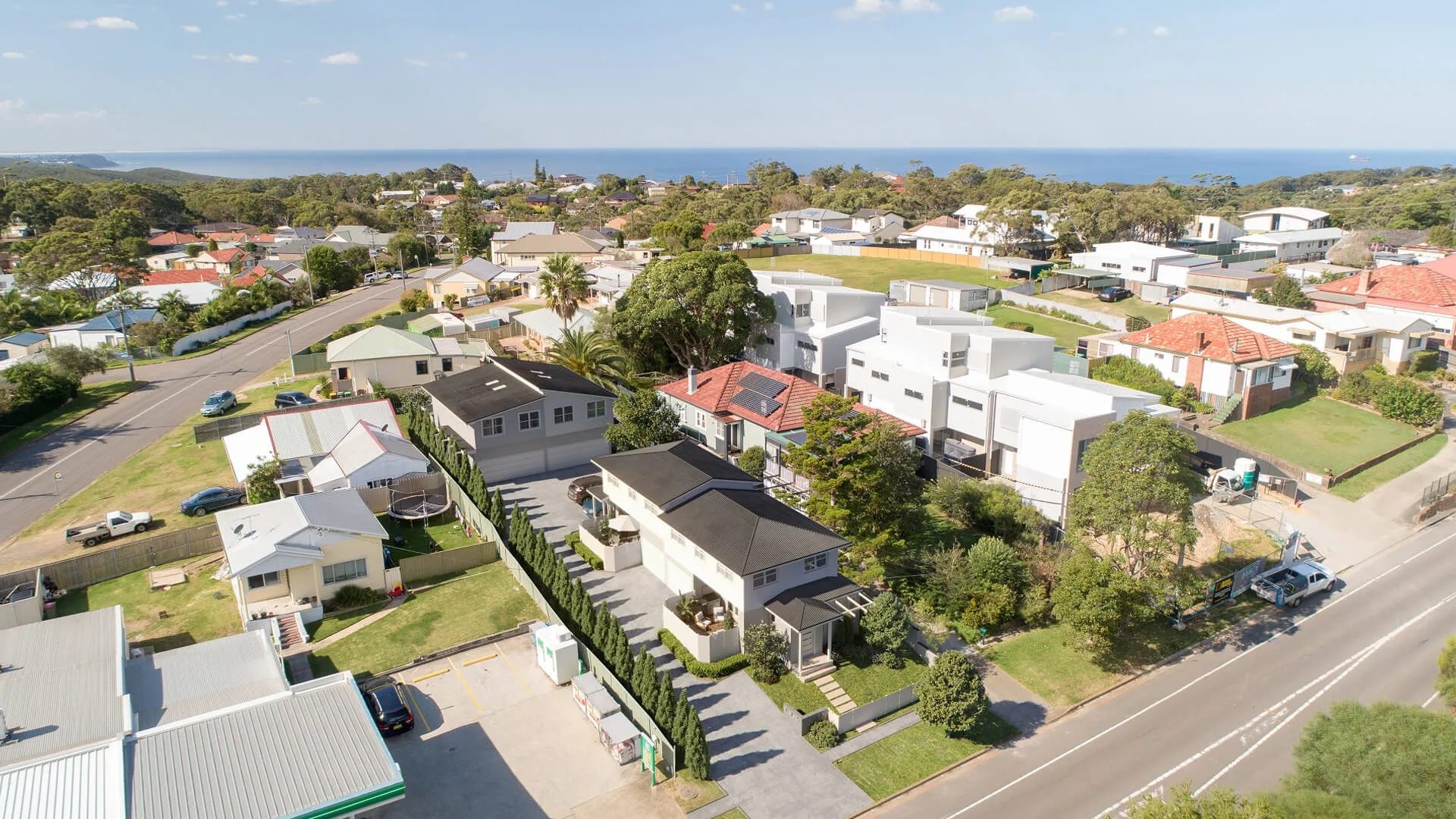 After-Aerial property photo before and after adding a CG house to the site