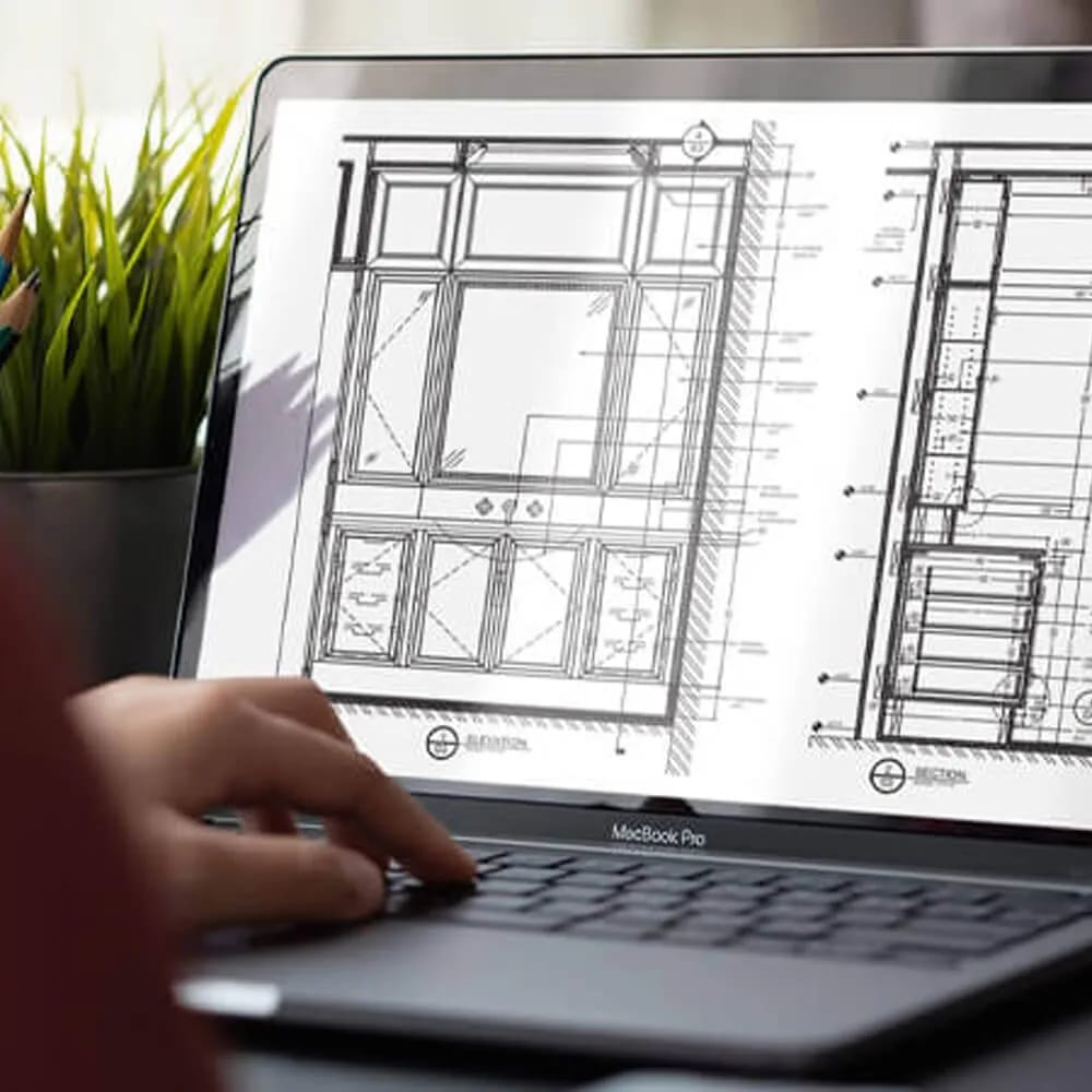Drafting for real estate rendering services: floor plan open on a laptop