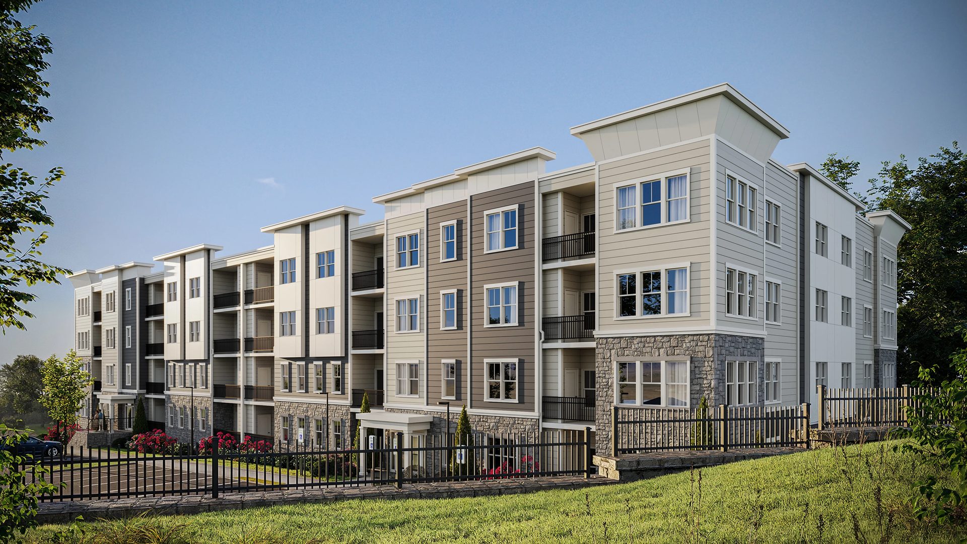 3D rendering of a four-story siding-and-stone residential complex with balconies, iron fencing, and landscaped grounds in Massachusetts