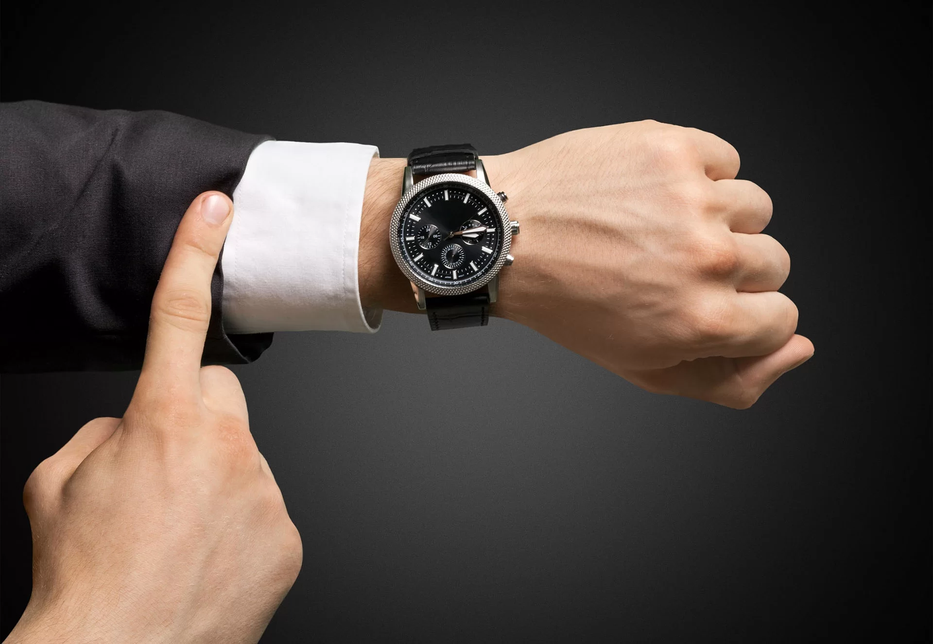 Architect Pointing at a Watch