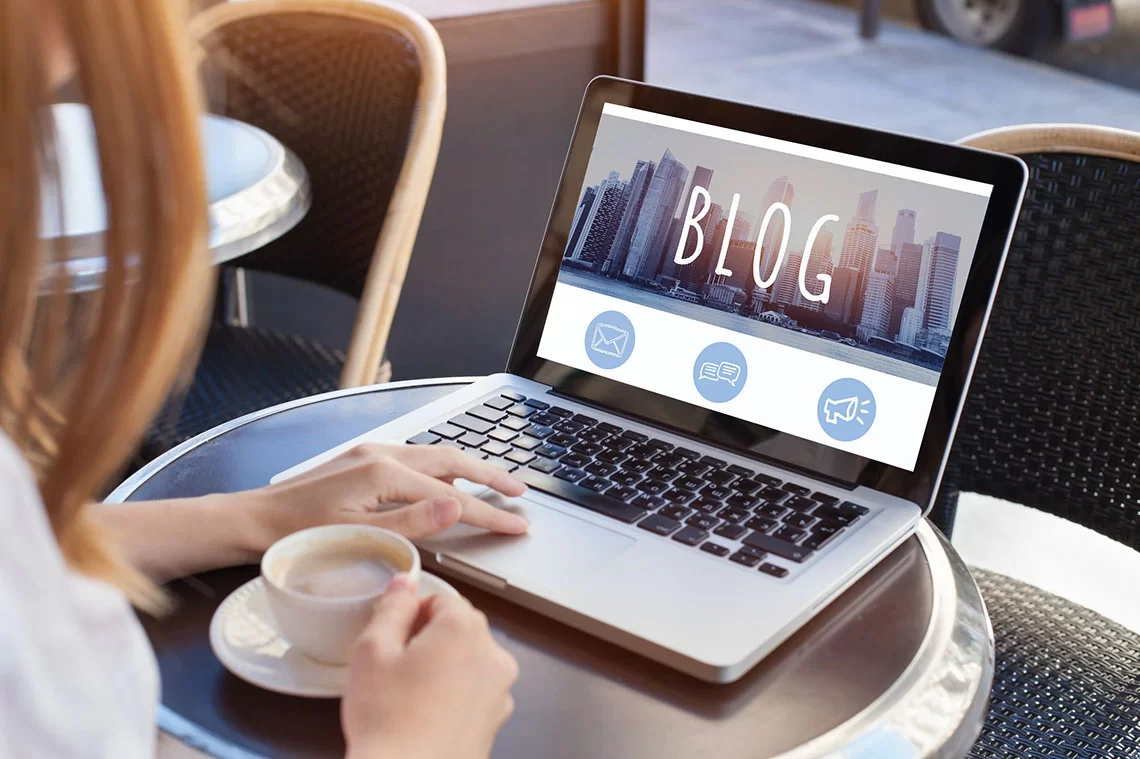 Architect Updating Her Blog in a Cafe