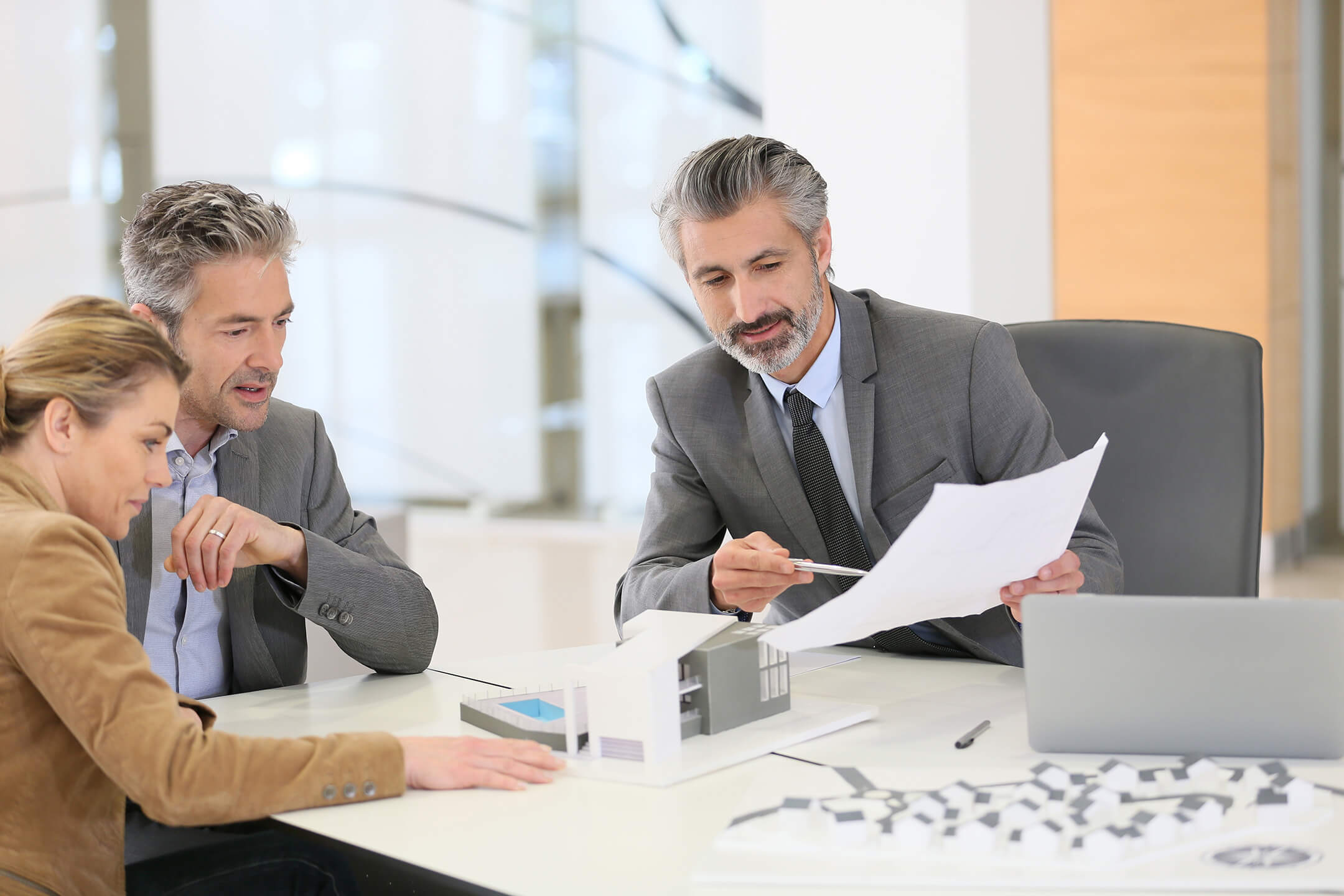 People Discussing an Architectural Concept