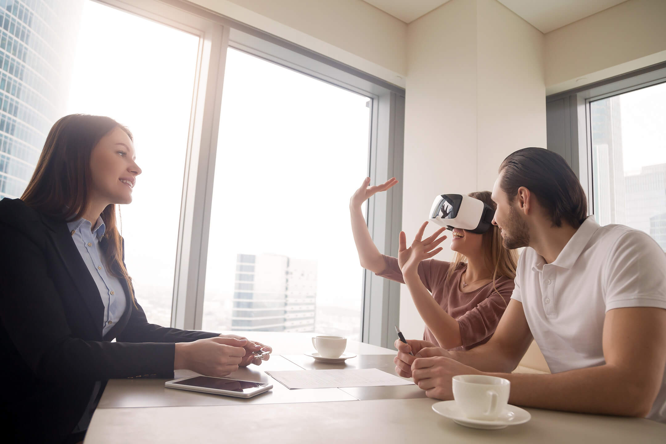 Prospects Having a VR Experience at a Real Estate Sales Office