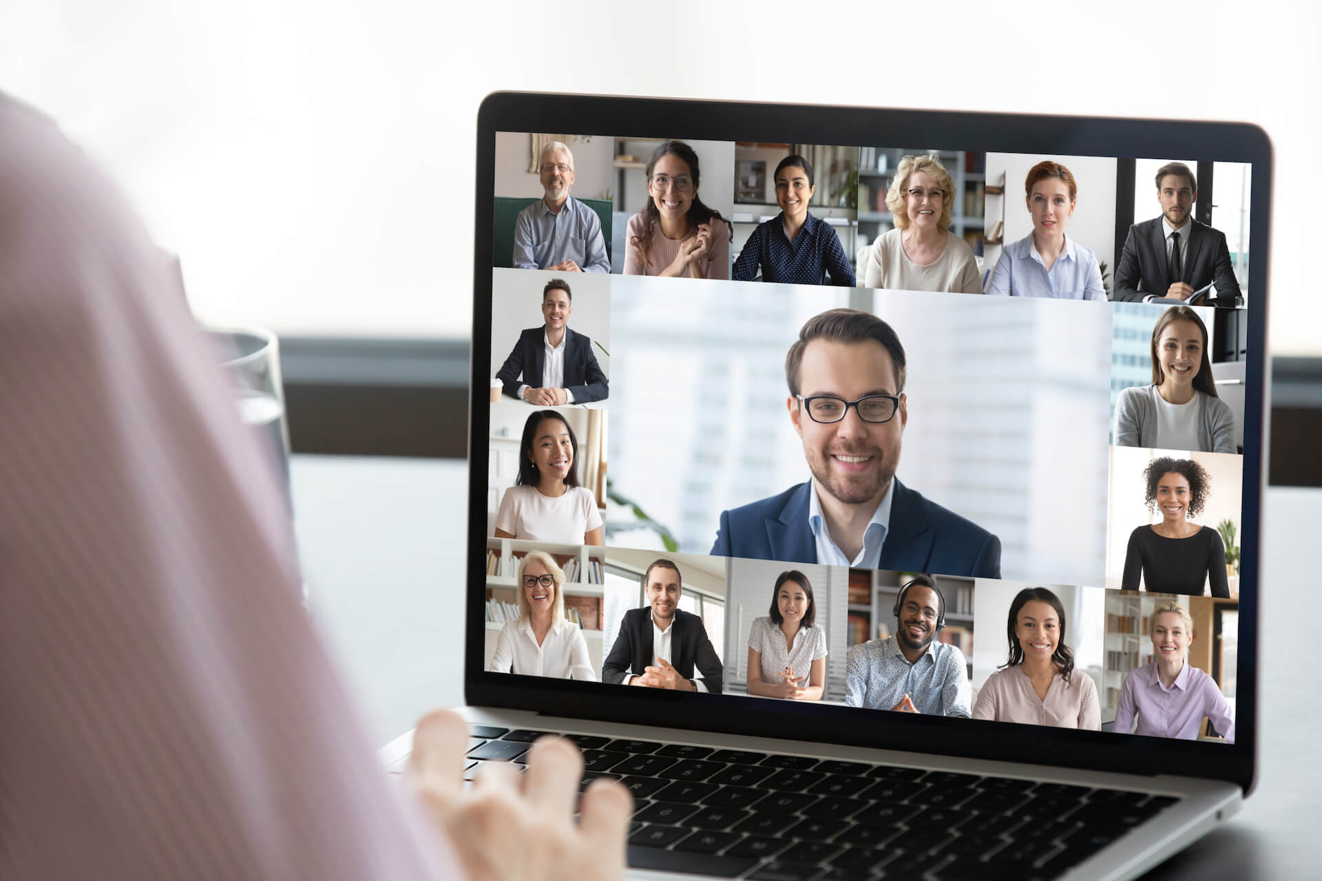 Architect Looking at Computer Screen During Zoom Meeting