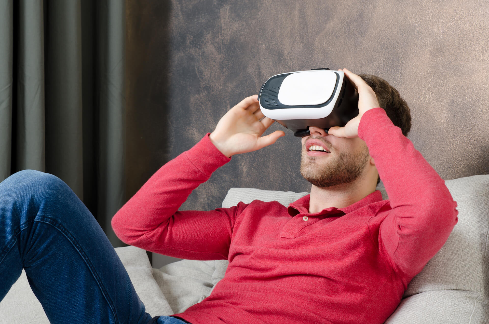 Man Looking at Real Estate for Sale In VR
