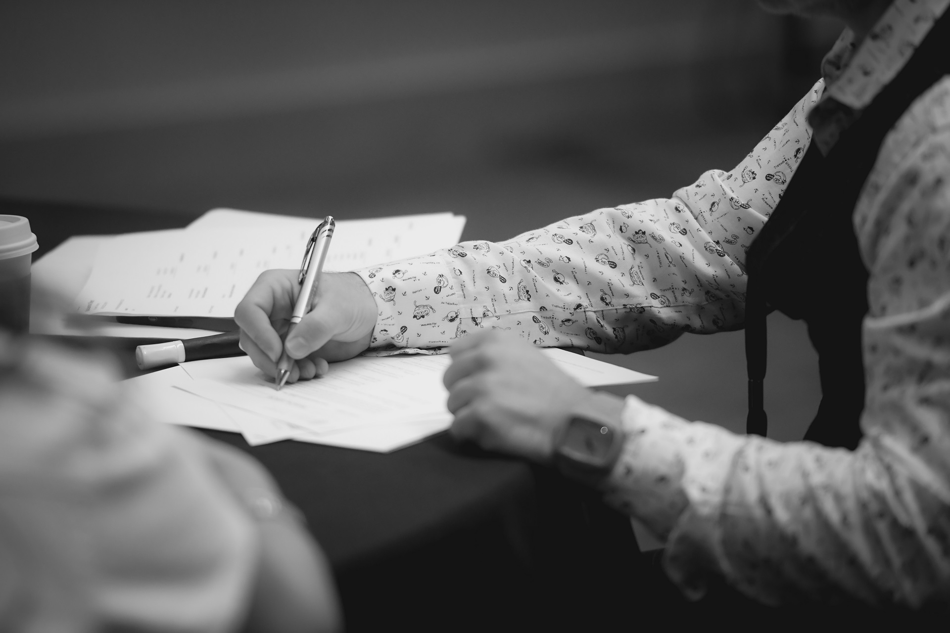 Gail Doby Signing a Document