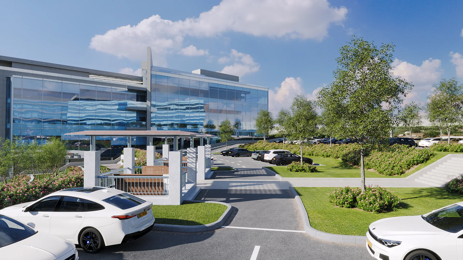 3D visualization of an office campus entrance with driveway, parking, and landscaped greenery