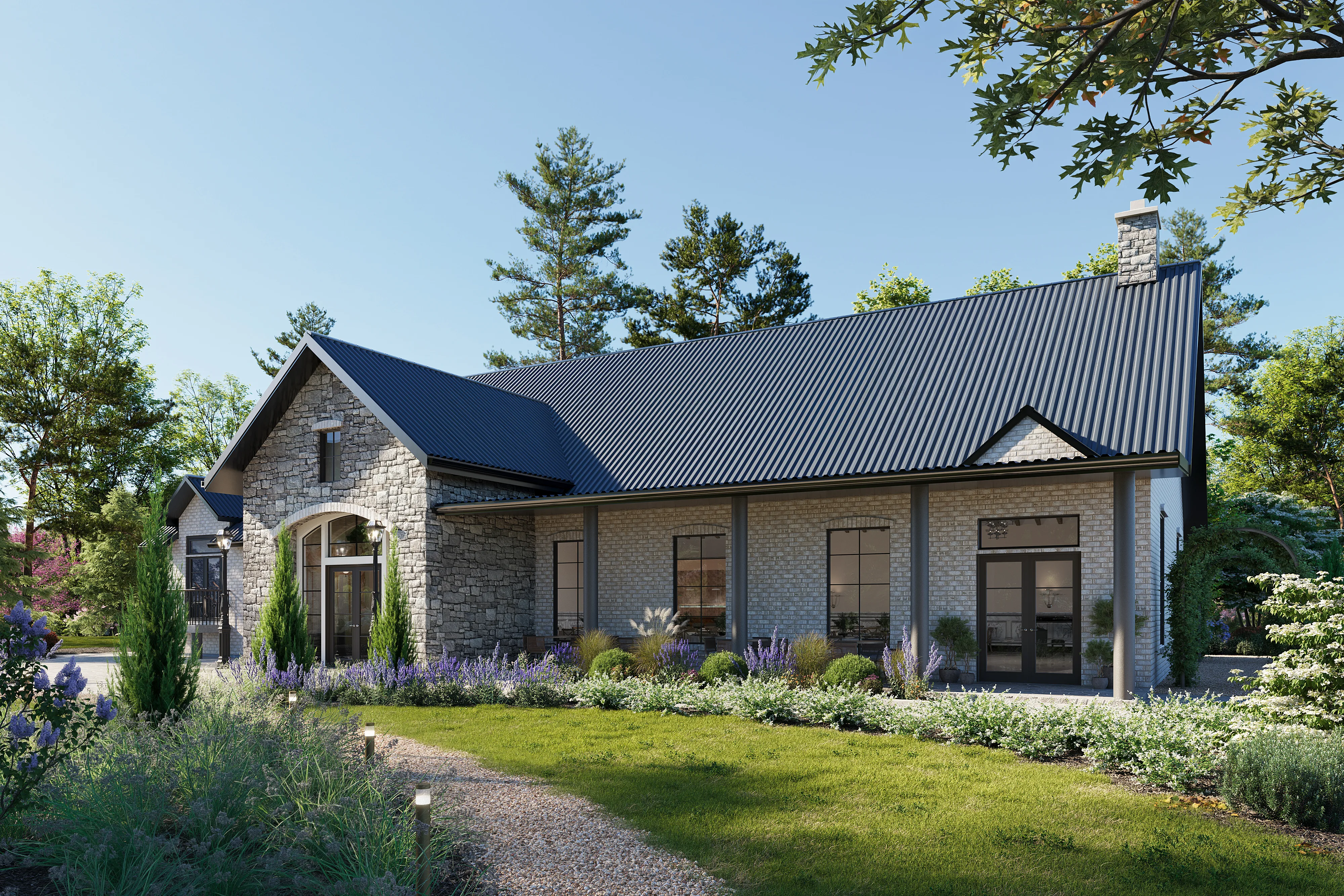 Light stone event venue with tall windows and a curved gravel path lined with lavender