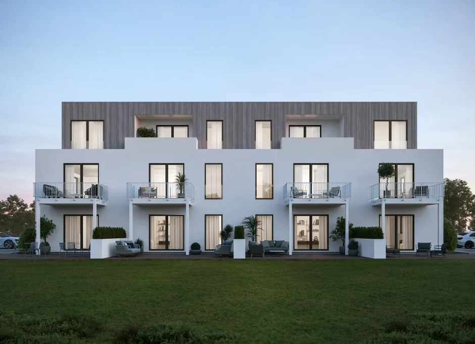 A modern multi-family housing block with balconies stands against an open lawn at dusk in crisp 3D rendering.