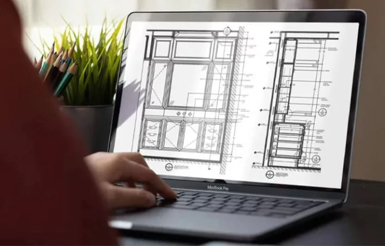 Drafting services image showing cabinet elevation and section drawings displayed on a laptop screen